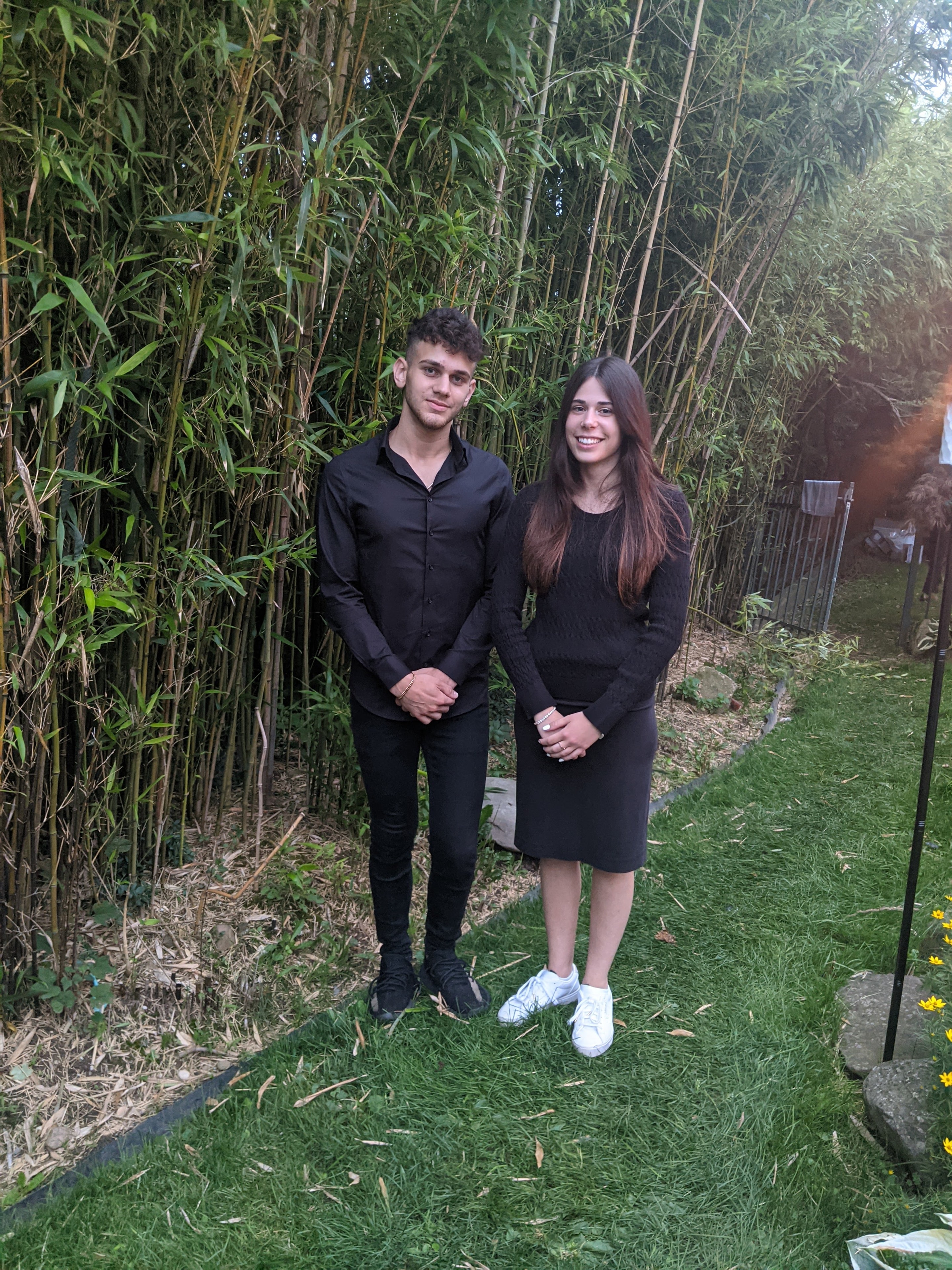 Two guests posing in the garden at the 2021 Arizal Siyum