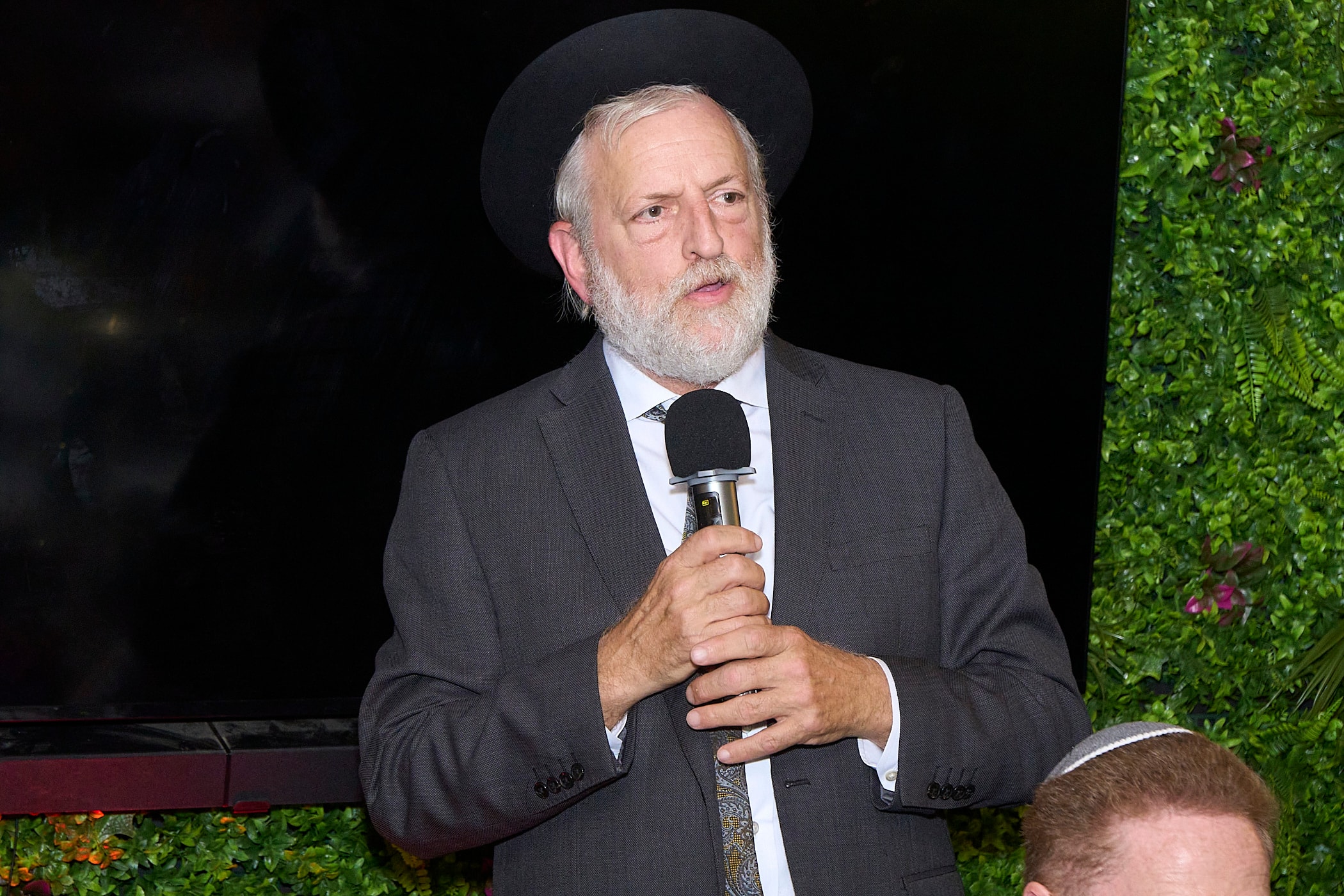 R' Simcha Kalish speaking at the 2025 Arizal Siyum & Dinner