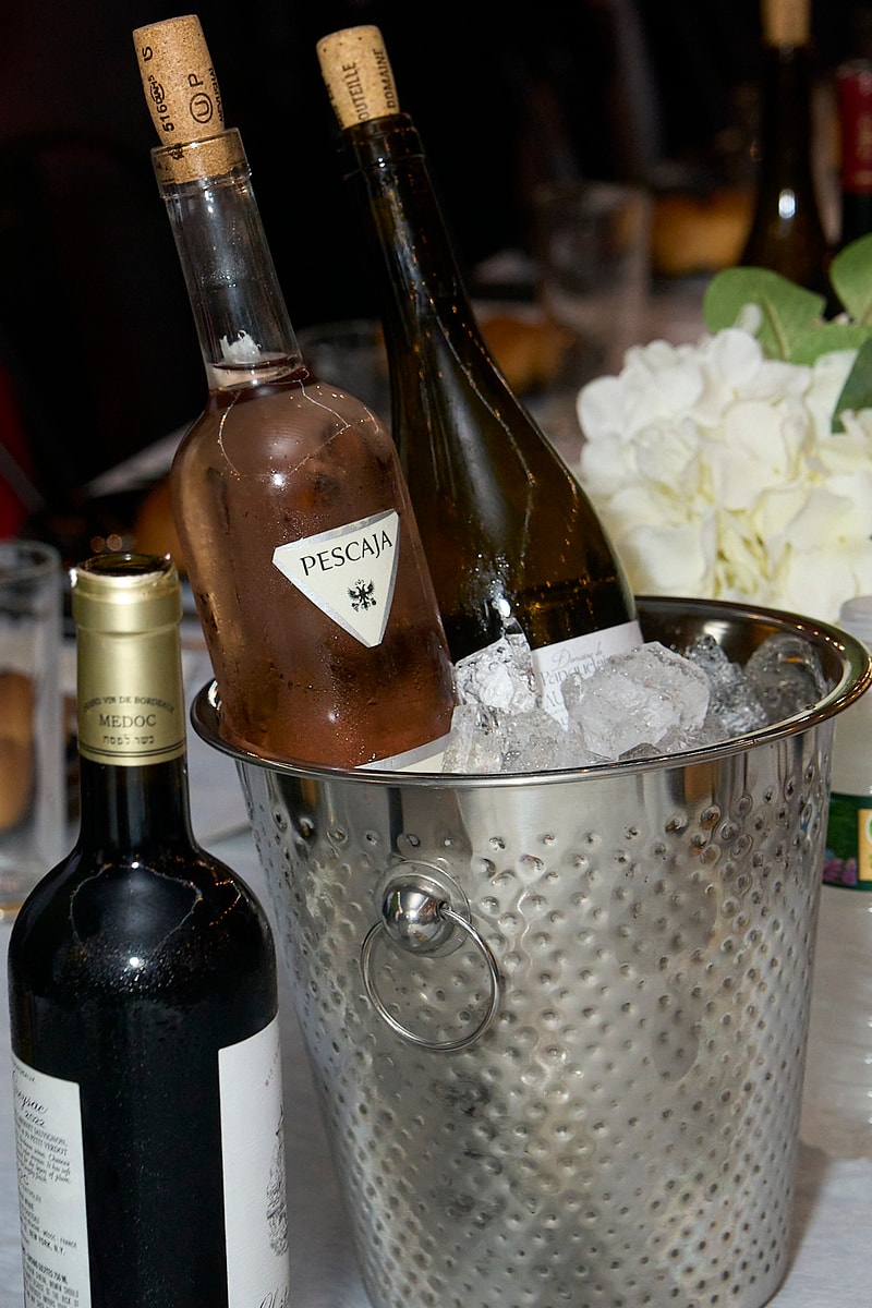 Wine bottles on the table at the 2025 Arizal Siyum & Dinner