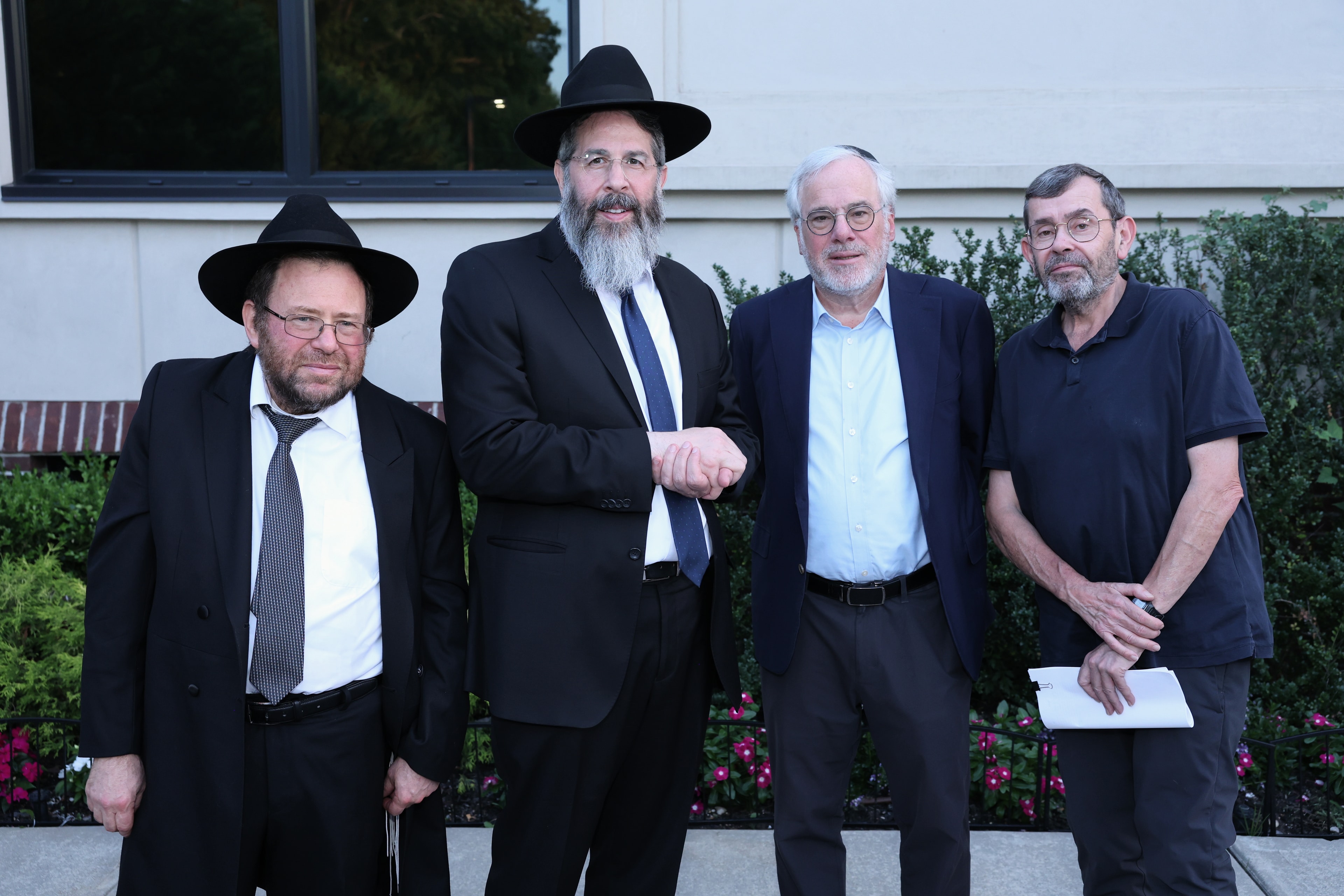 Rabbi Bechhofer, Rabbi Plutchok and friends at the 2026 Arizal Siyum & BBQ Dinner