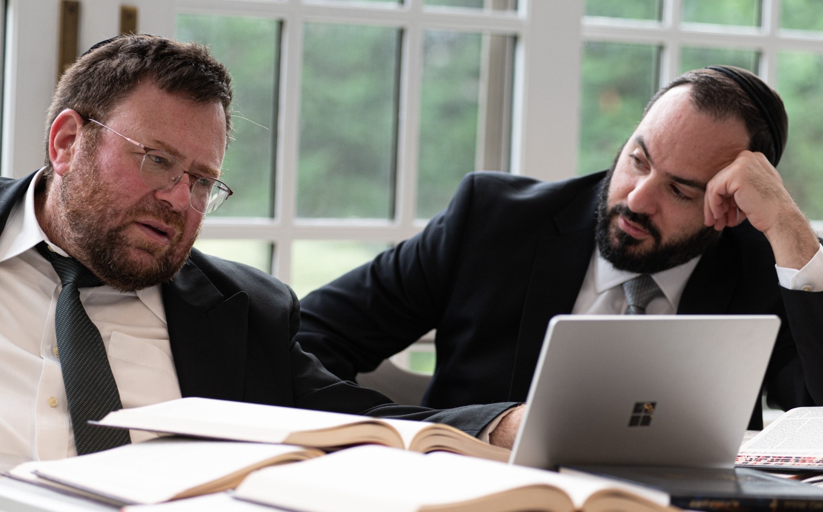 Rabbi Bechhofer and Rabbi Zecharia Holzer collaborating on Torah scholarship